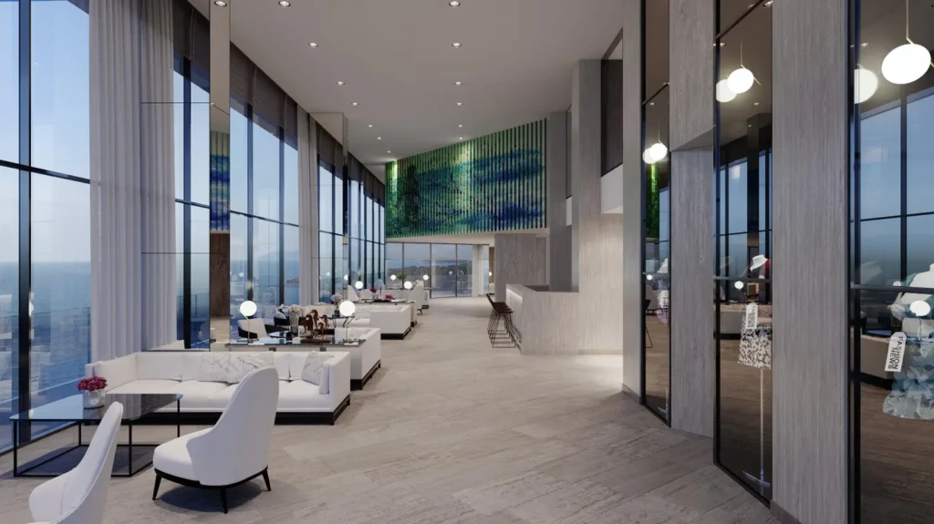 A modern office lobby with large windows offering a panoramic view of the city skyline.